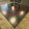 AK Athletic Equipment CLEARANCE 12' X 12' X Ultra Shock Roll Up Wrestling Mat - Black With Red Circles Wrestling Mats