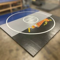 AK Athletic Equipment CLEARANCE 12' X 12' X Ultra Shock Roll Up Wrestling Mat Blue, Black, And Grey With Logo Wrestling Mats